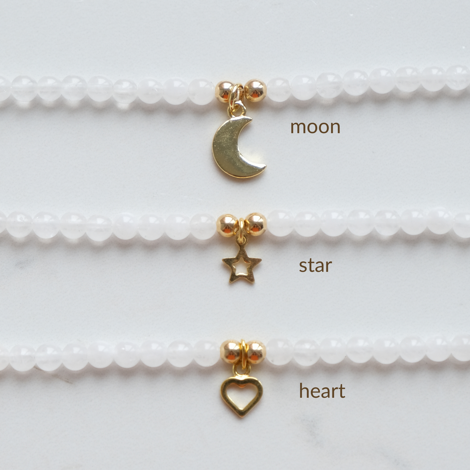 Gold charms: moon, star, heart