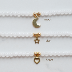 Gold charms: moon, star, heart