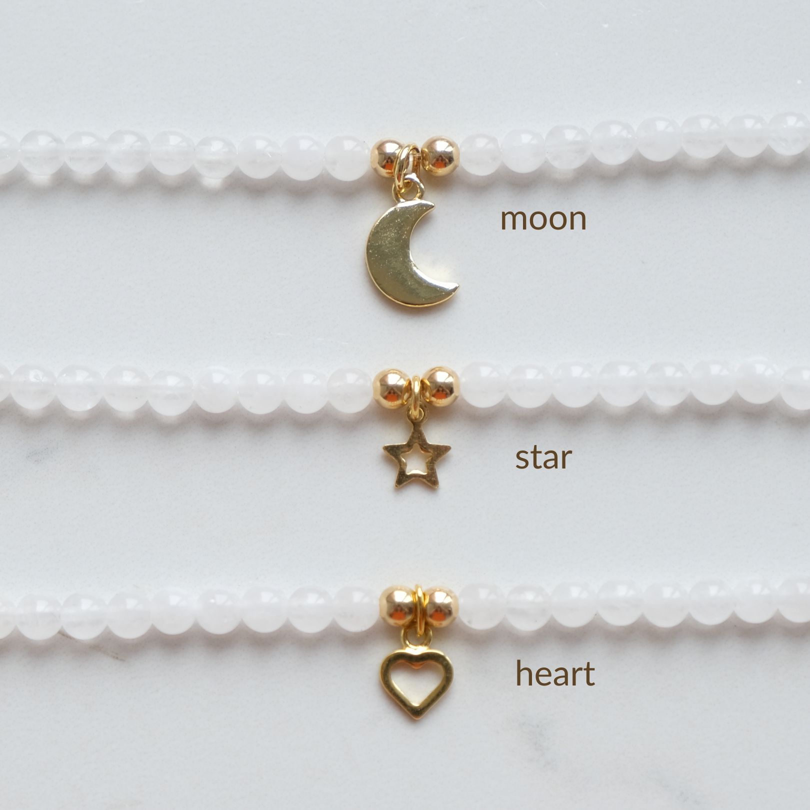 Gold charms: Moon, star and heart