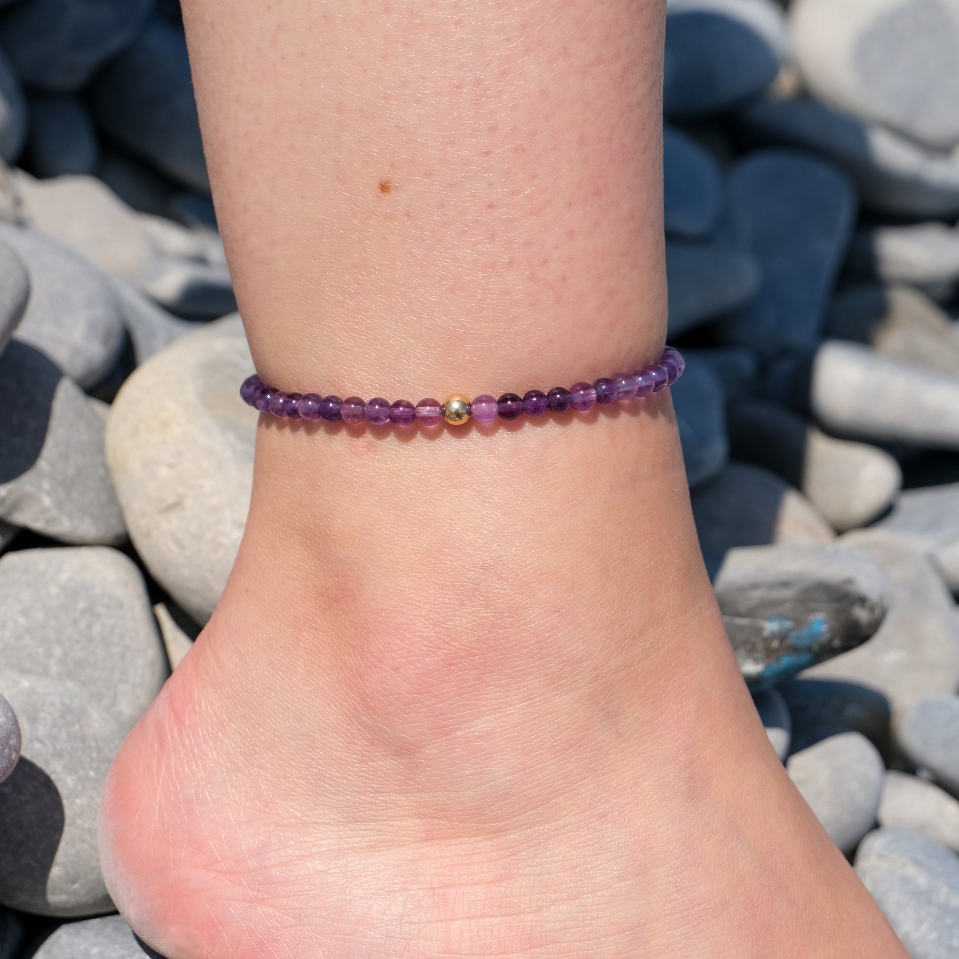 Amethyst crystal anklet with gold feature bead