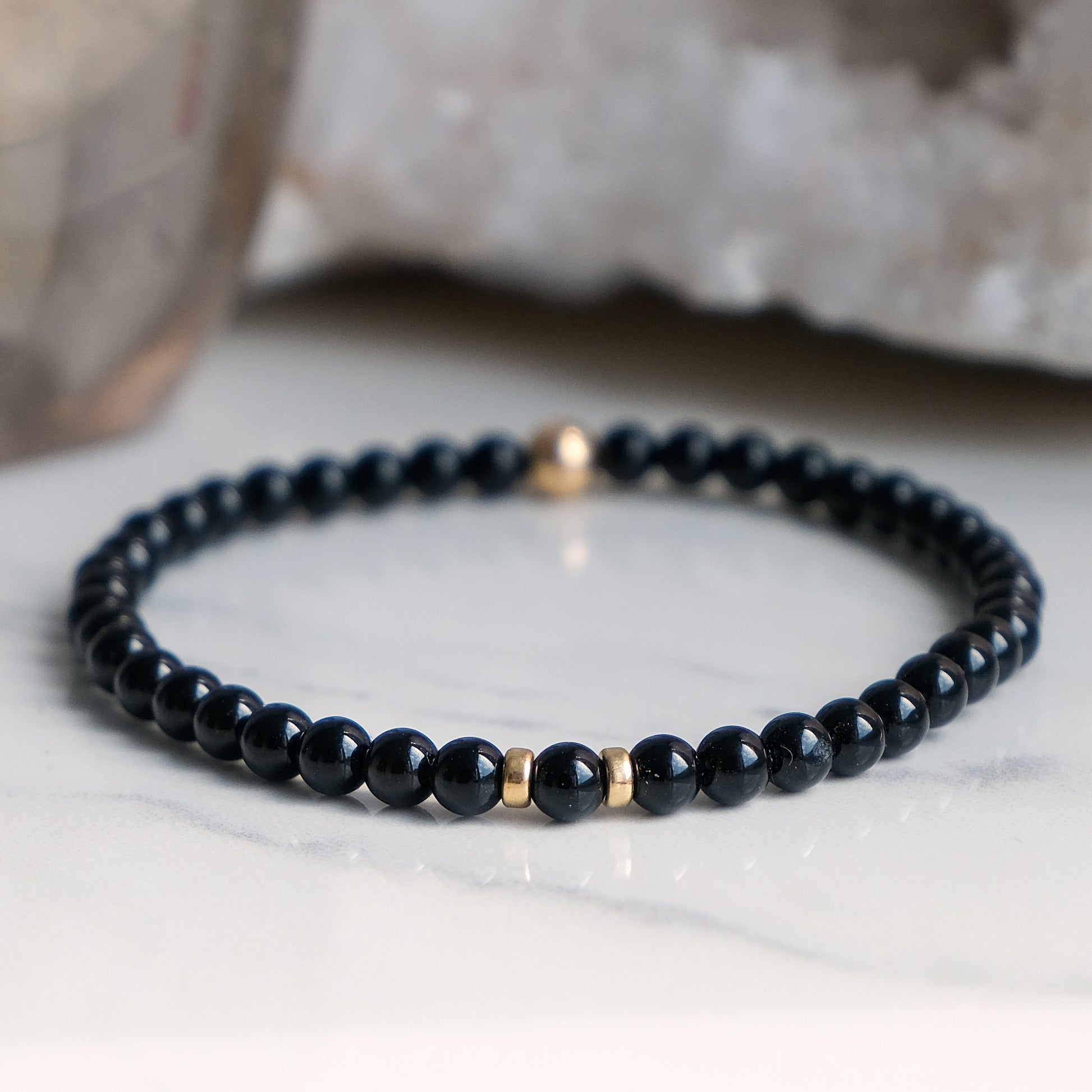 4mm black tourmaline beaded bracelet with  gold accessories