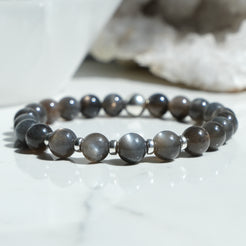 An 8mm black moonstone gemstone bracelet with 925 sterling silver accessories 