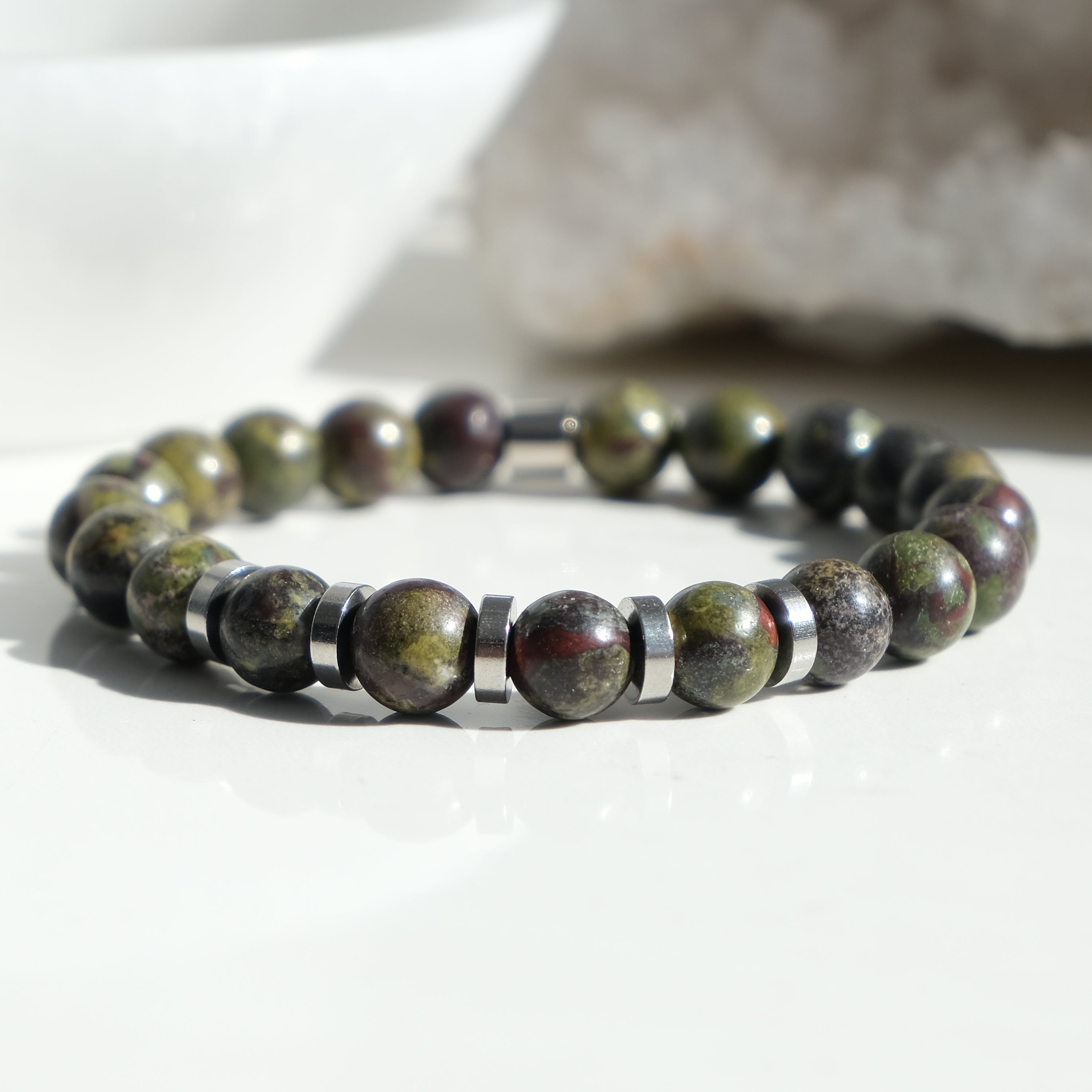 A dragon's blood jasper gemstone bracelet with stainless steel accessories