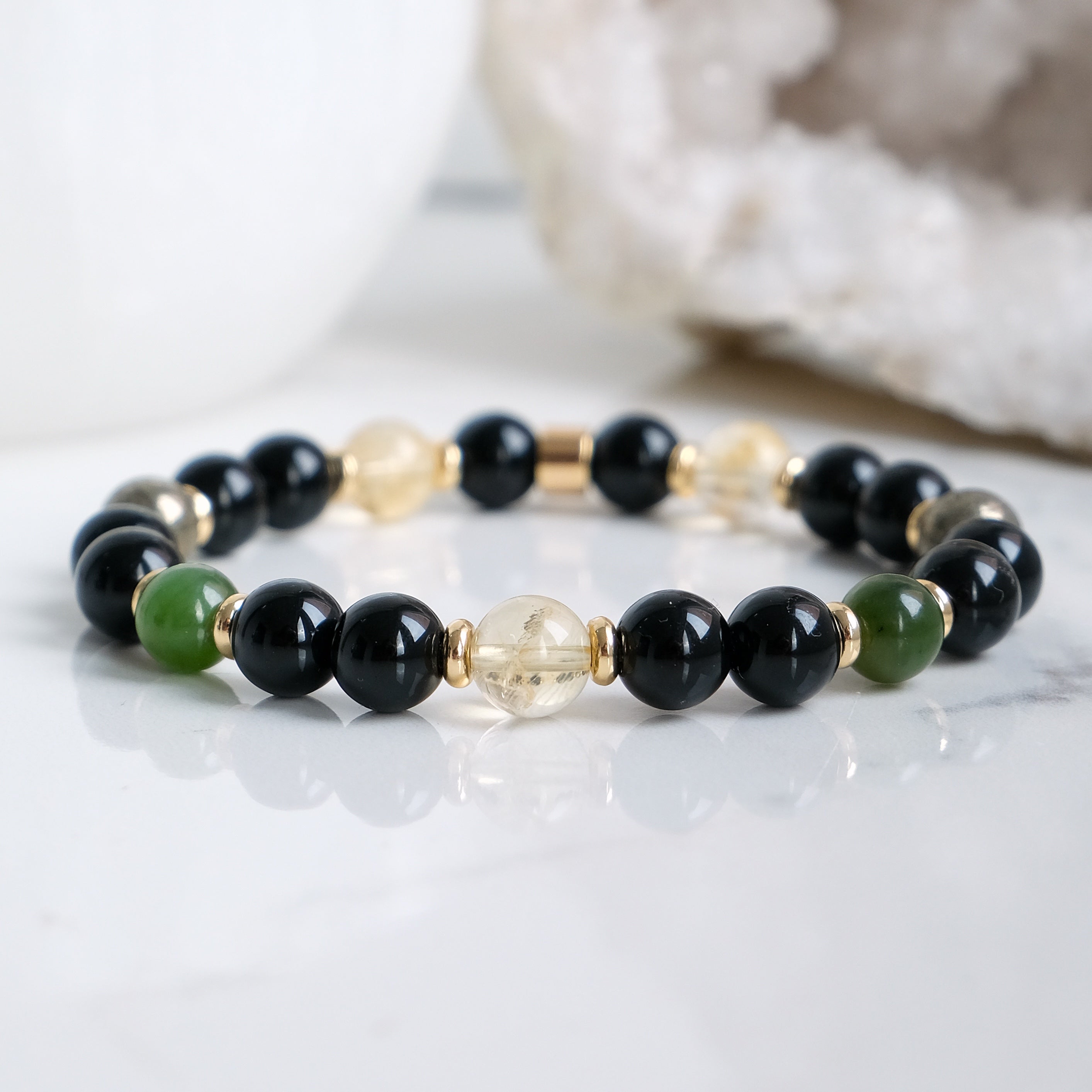 Samayla manifestation gemstone bracelet with gold accessories