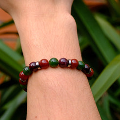 Unity in love gemstone bracelet worn on a model's wrist